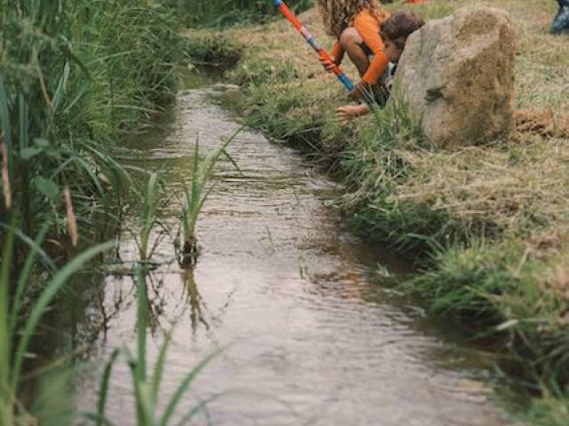 Man by creek