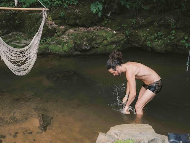 man in river